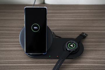 Watch and smartphone batteries charged