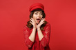 © ViDi Studio - Portrait of excited young woman in lace dress, cap looking camera, holding hands near face isolated on red wall background in studio. People sincere emotions lifestyle concept. Mock up copy space.