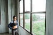 © Odua Images - pose of active woman wearing jacket after workout at the gym