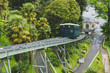 Funicular cars traveling on tracks in downtown Pau, France