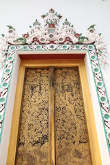 gilded wooden door,  Buddhist temple