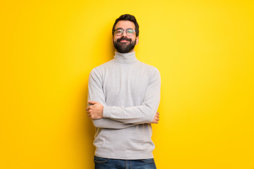 Man with beard and turtleneck With happy expression