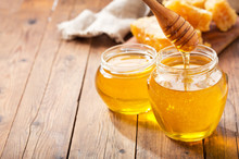 Jar Of Honey With Honeycombs