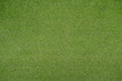 Green artificial grass or fake turf abstract texture.