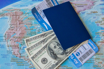 International travel concept: Passport, tickets, money on the map