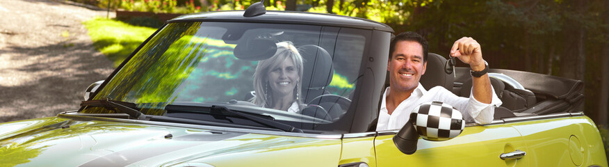 Couple driving the car.