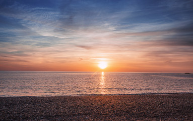 Poster - Sunset over Stony Beach in North Wales