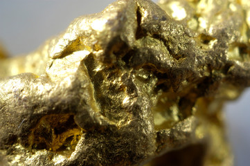 Golden nugget background close up