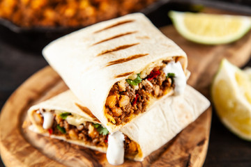 Poster - Mexican burrito with beef, beans and sour cream