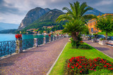 Fototapeta  - Colorful flowers and spectacular walkway, Lake Como, Menaggio, Lombardy, Italy