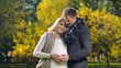 © motortion - Lovely couple touching pregnant tummy, medical clinic for maternity care welfare