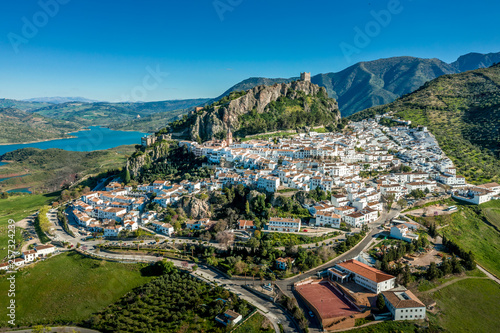 Cuadros en Lienzo Zahara de la Sierra aerial view of medieval castle, hilltop village and lake nea
