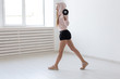 © satura_ - Healthy lifestyle, people and sport concept - Young and fit woman workout with weight