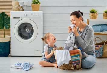 Wall Mural - family doing laundry