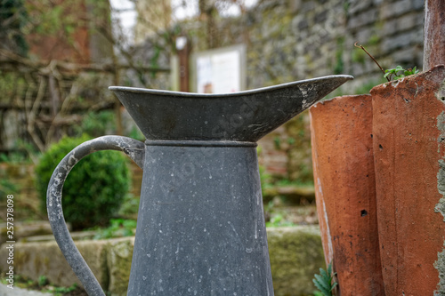 Rusty Metal Jug For Garden Watering Plants This Stock Photo Rusty Metal Jug For Garden Watering Plants