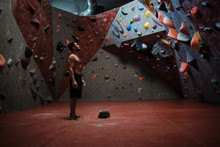 Athletic Man Practicing In A Bouldering Gym