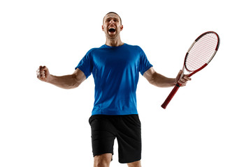 Portrait of a handsome male tennis player celebrating his success isolated on a white studio background. Human emotions, winner, sport, victory concept