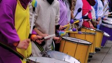 A Band Of Drummers Is Playing In The City Center And Shopping Street Of Cologne During Carnival