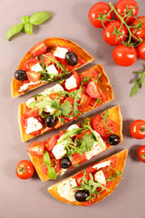 Canvas Print - bruschetta with tomato, mozzarella and basil