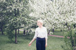 © aaalll3110 - portrait of a beautiful blonde with short hair among flowers