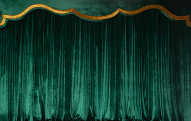 Wall Mural - Green curtain of luxurious velvet on the theater stage. Copy space. The concept of music and theatrical art.