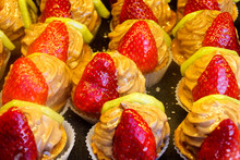 Vibrant Strawberry Shortcakes Assorted At Patisserie Shelf