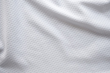 White fabric sport clothing football jersey with air mesh texture background