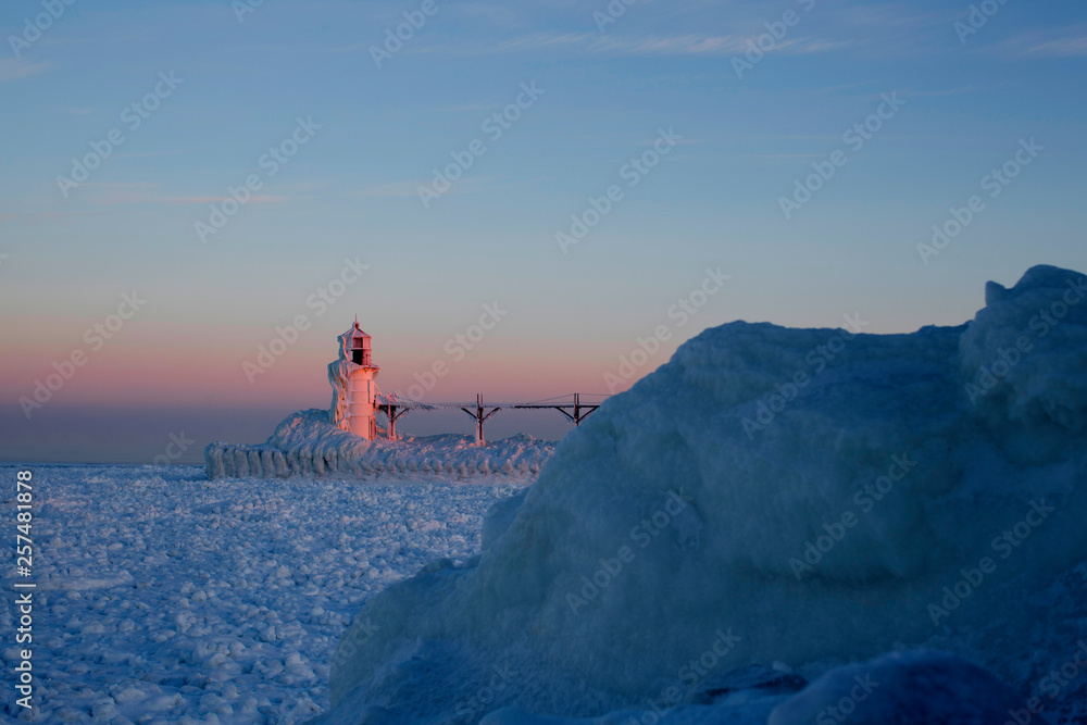 St. Joseph, Michigan, lighthouse is frozen on the shores of Lake ...