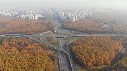 Wall Mural - Top view of the multi-level road junction in Moscow from above, car traffic and many cars, the concept of transportation. road junction at the intersection of the Kievskoe highway and the ring road