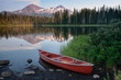 © Cavan Images - Red canoe by Scott Lake, Oregon, USA