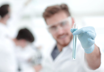 Wall Mural - closeup. scientist with beaker