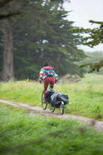 Young Woman Riding On Bike Santa Cruz, California, USA