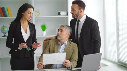 Wall Mural - The three business people discussing in the office room