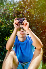 Canvas Print - Young Man with a Camera