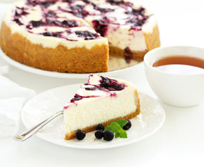 Wall Mural - Homemade cheesecake with black currant jelly.