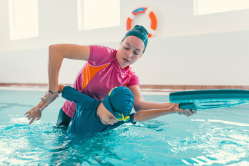 Boy on swimming class