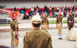 © SB Stock - Portrait of an unrecognizable indian policeman standing. Rear view.