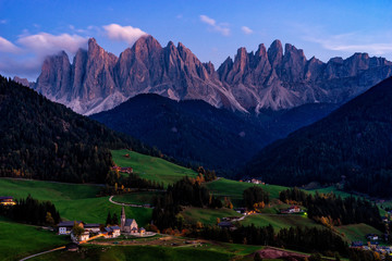 Wall Mural - Santa Maddalena village with magical Dolomites mountains in background, Val di Funes valley, Trentino Alto Adige region, Italy, Europe. Night view of dramatic Italian Dolomites landscape.