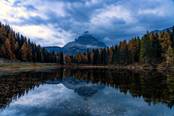 Wall Mural - Autumn landscape of Antorno lake with famous Dolomites mountain peak of Tre Cime di Lavaredo in background in Eastern Dolomites, Italy Europe.
