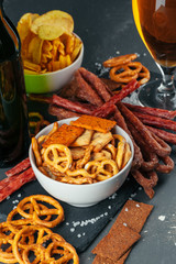 Assortment of beer snacks close up on counter