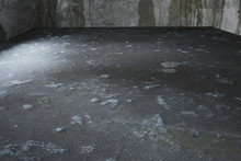 Dirty Grunge Floor With Dried Cololr Spots And Carpet Remnants