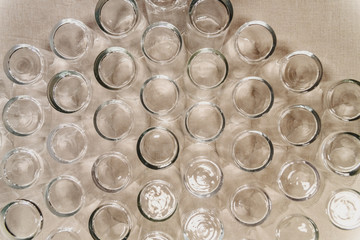 Poster - Many empty glass vessels seen from above.