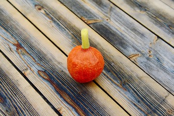 pumpkin on wooden table