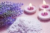 Fototapeta Lawenda - Bath salt with the scent of lavender on a pink background.