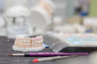 Dental plaster stone model work of making a bridge and crowns in progress in dental laboratory by the dental technician