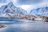 Fototapeta Góry - Lofoten Islands Archipelago Spring Scenery with Traditional Red and Yellow Fisherman Rorbu Cabins in The Village of Sakrisoy at Sunrise in Norway.