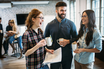 Portrait of architects having discussion in office