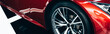 © LIGHTFIELD STUDIOS - panoramic shot of new shiny red automobile with metallic wheel