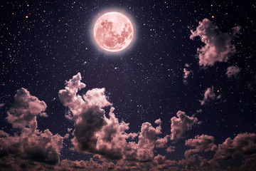 backgrounds night sky with stars and moon and clouds. pastel coral color