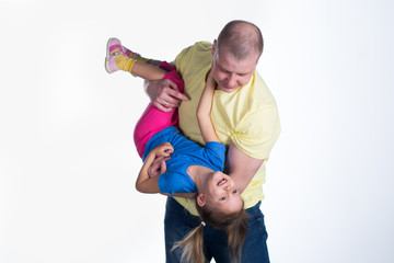 young man playing with baby